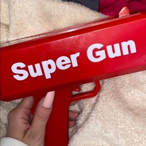 money gun, comes with fake $